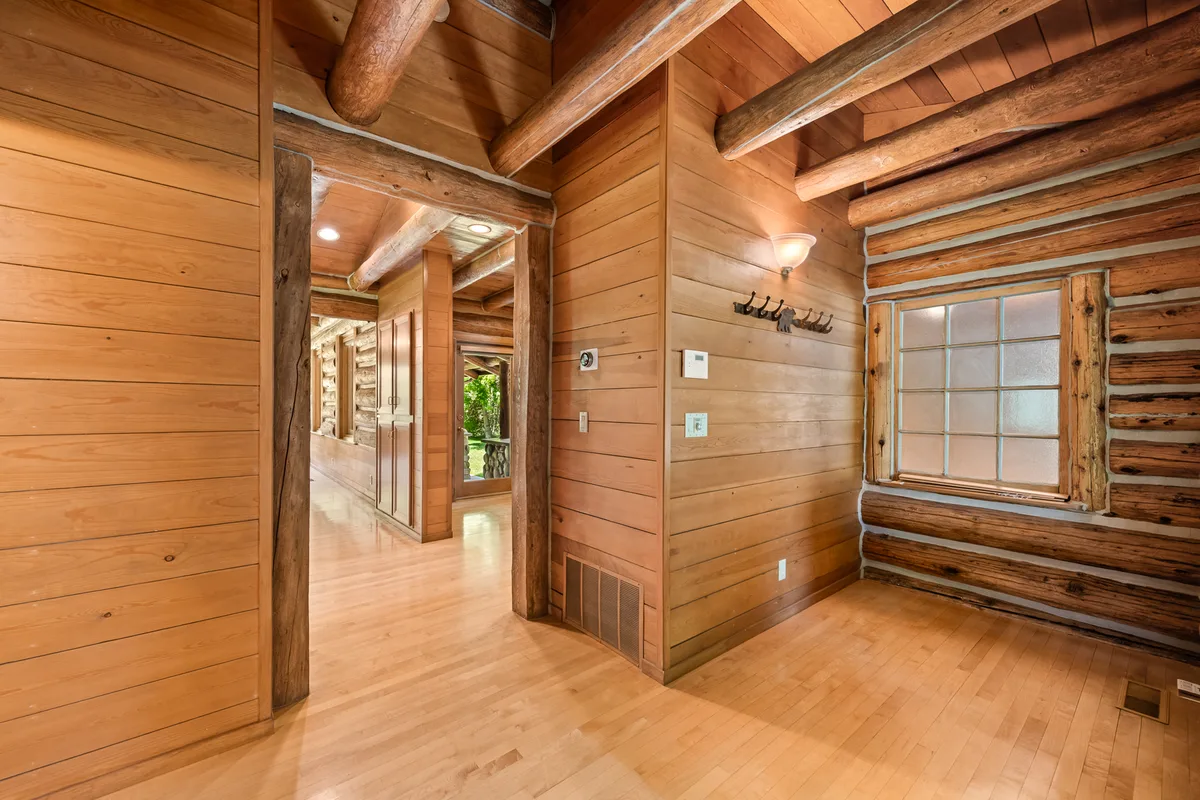 Historic Fabian Cabin sheltered beneath mature trees